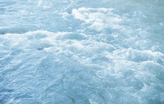 Mountain river surface, natural water background, top view.