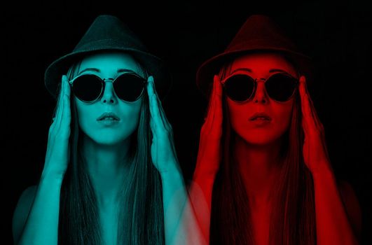 Double color and anaglyph effect of stylish young woman in glasses.