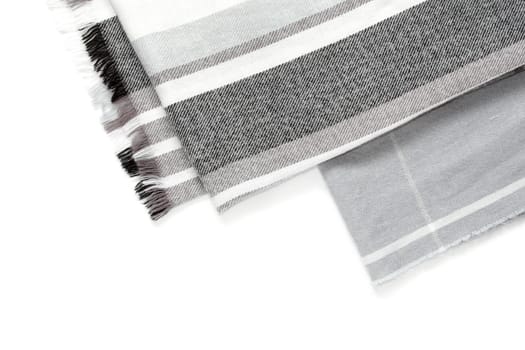 Part of a beautiful gray scarf in a cage isolated on a white background with an area for text