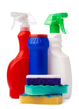 Bottles with cleaning products and sponge on a white isolated background, copy space