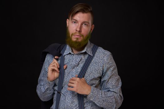bearded man elegant style shirt dark background. High quality photo