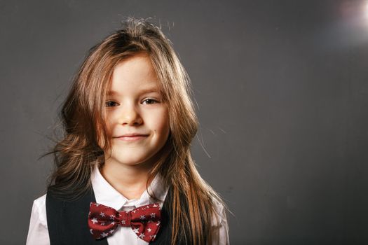 Beautiful girl with long hair, studio portrait