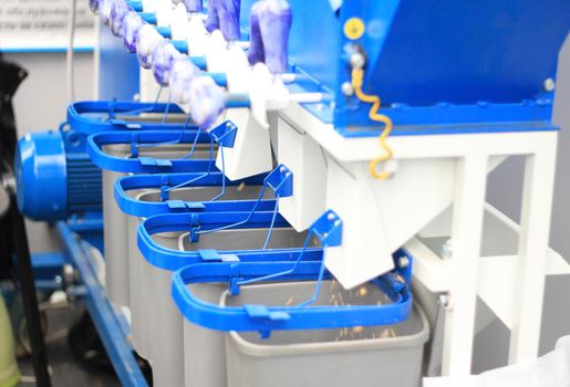 Agricultural machinery, devices for dosage at the exhibition, agribusiness concept