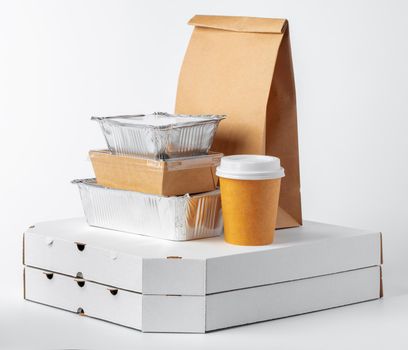Set of recyclable food packaging on white background close up