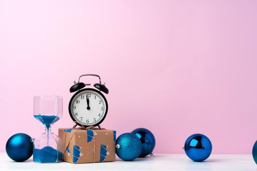 Christmas and New Year celebration countdown concept with alarm clock