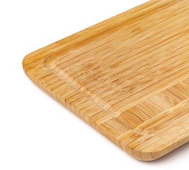 Wooden cutting board on a white background, close up