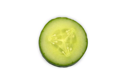 Freshly sliced cucumber close-up on a white background