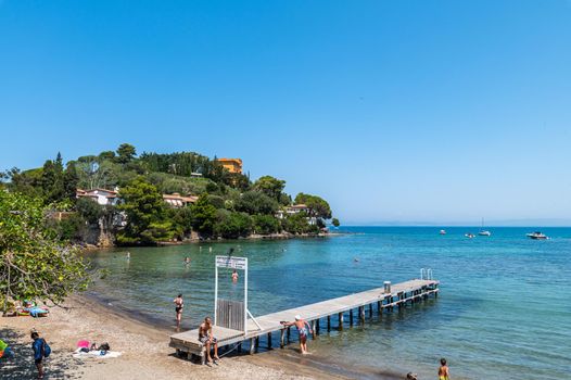 porto santo stefano,italy july 24 2021:beach landscape in Porto Santo Stefano