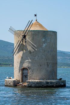 famous mill in the sea in Orbetello in the summer