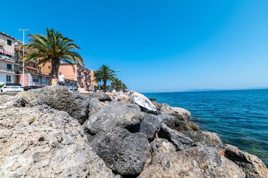 porto santo stefano,italy july 24 2021:Porto Santo Stefano landscape the cliff and the sea