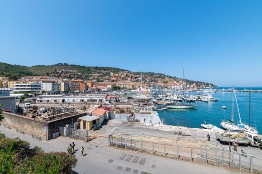 porto santo stefano,italy july 24 2021:Porto Santo Stefano landscape seen from the port