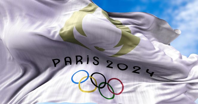 Tokyo, Japan, July 2021: Paris 2024 olympic flag waving in the wind. Paris 2024 summer olympics games are scheduled to take place from 26 July to 11 August 2024 in Paris, France