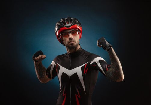 guy is a cyclist in a Bicycle helmet