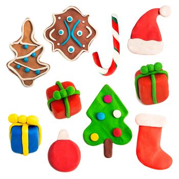 colorful christmas figures made of plasticine isolated on white background
