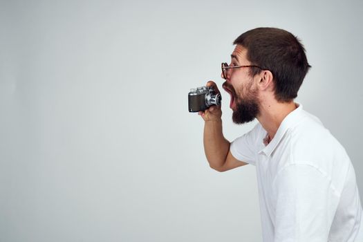 bearded man camera professional technology light background. High quality photo