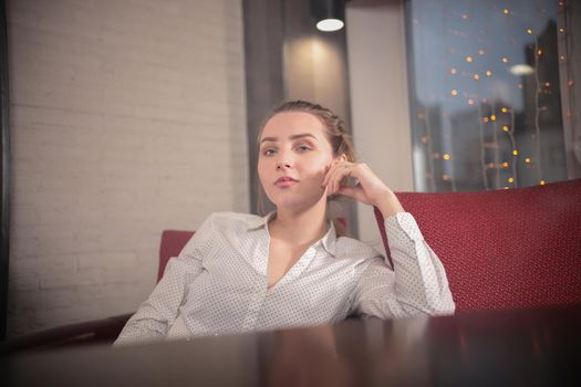 Portrait of young serious woman. Close up shot