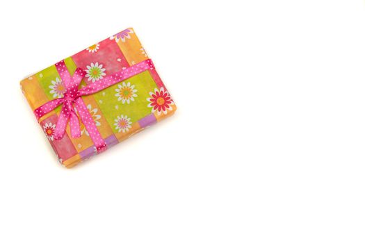 present on a white background with lilac ribbon bow brown paper