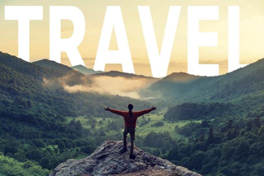 Happy young man standing with raised arms in summer mountains at sunset. Word travel in the sky.