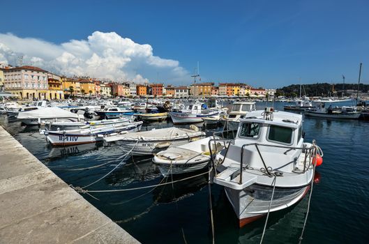 Vrsar, Croatia - May 22, 2018: Pier in coastal town of Vrsar, Istria, Croatia. Vrsar - beautiful antique city, yachts and Adriatic Sea.