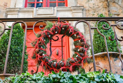 Christmas wreath of Christmas tree branches and cones