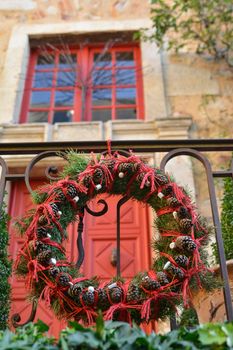 Christmas wreath of Christmas tree branches and cones