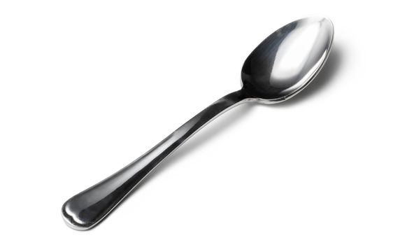 Cutlery dessert spoon isolated on white background. Close up.