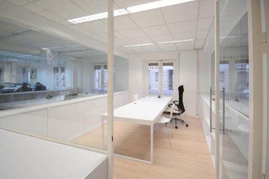Empty modern office with white furniture
