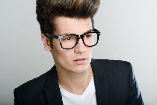 Portrait of a young man with eyeglasses