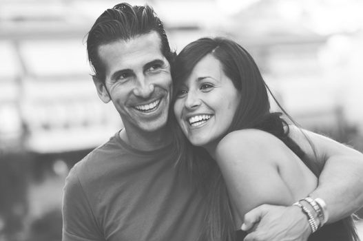 Closeup portrait of a beautiful young couple smiling together