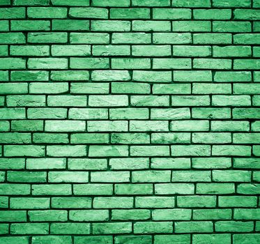 Green Brick wall texture close up. Top view. Modern brick wall wallpaper design for web or graphic art projects. Abstract background for business cards and covers. Template or mock up.
