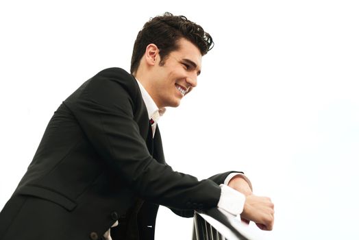 Portrait of a young businessman in urban background