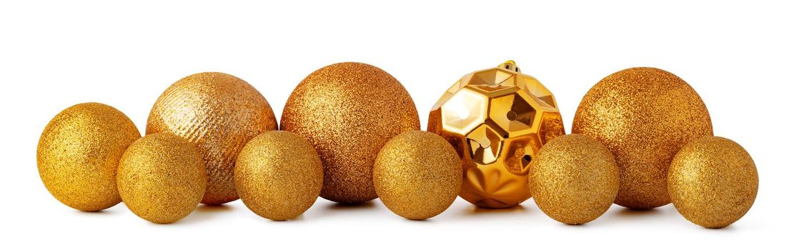 Pile of Christmas baubles isolated on white background, close up