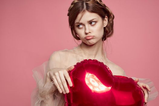 smiling woman heart in hands gift love romance. High quality photo