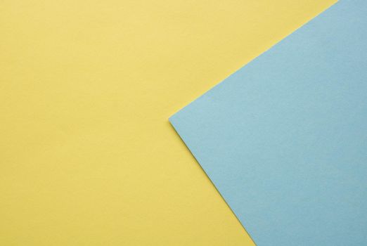 blue and yellow pastel paper color for background.