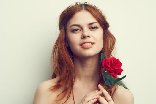 attractive woman with rose flower makeup romance model. High quality photo