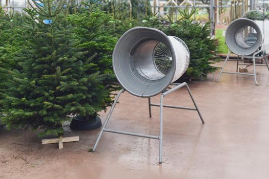 Christmas tree at a market and wrapping device