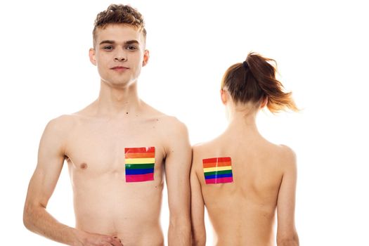 young couple lgbt Flag transgender lifestyle light background. High quality photo