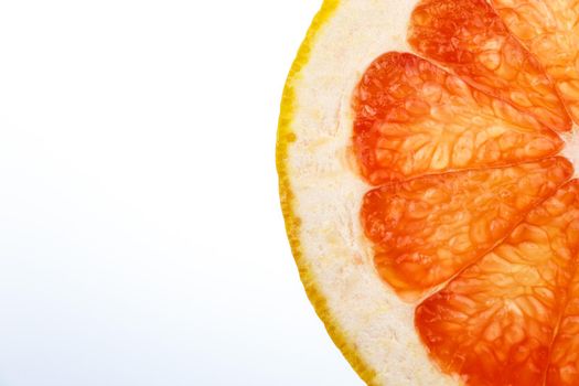grapefruit slice on white background
