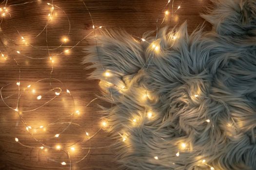 Long pile faux carpet and New Year's garland with lights