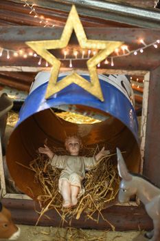 Baby Jesus laying in a cradle