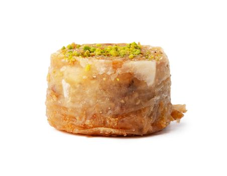 Turkish sweet pastry baklava isolated on white background, close up