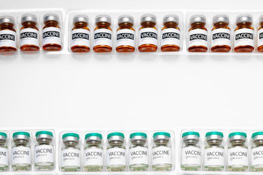 Pile of vials of Sars-cov-2 vaccine close up photo