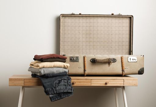 close up vintage suitcase with casual clothes