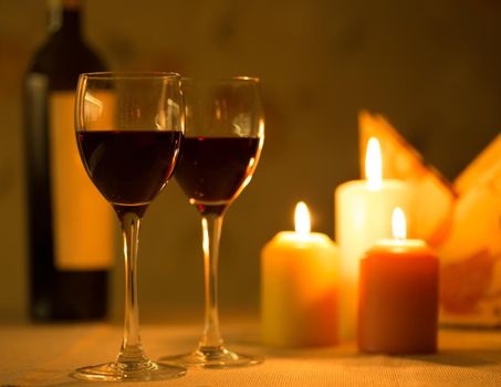 Romantic dinner with candles and wine