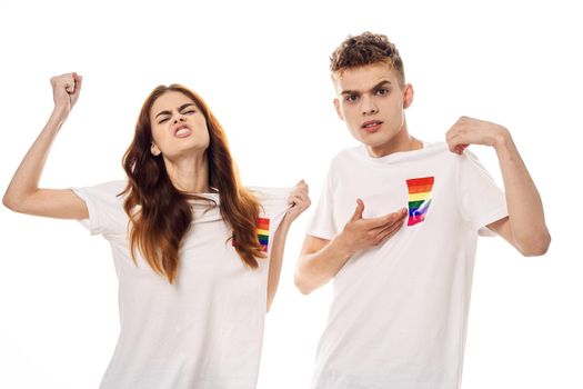 young couple in white t-shirts Flag lgbt transgender sexual minorities. High quality photo