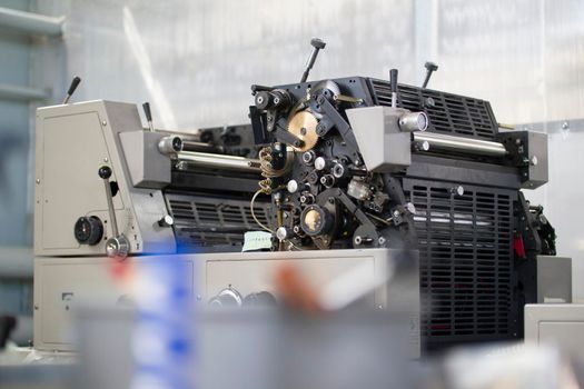 Modern printing press machine in a printing house, horizontal