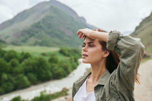 woman hiker nature mountains landscape fresh air. High quality photo