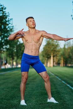 man doing exercises in the park inflated body. High quality photo