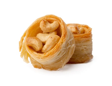 Close up photo of Turkish dessert baklava isolated on white