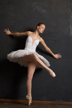 ballerina dance classic performance the dark background. High quality photo